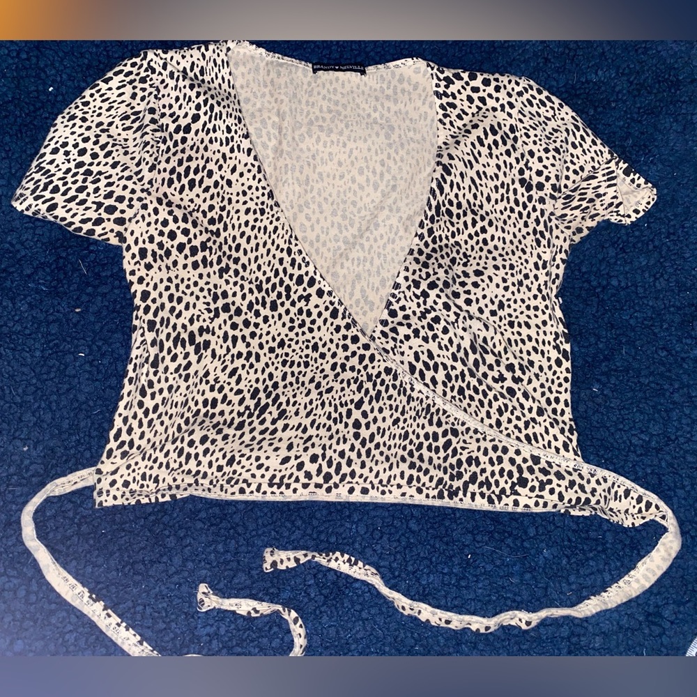 Brandy Melville wrap Cheetah top with no size.